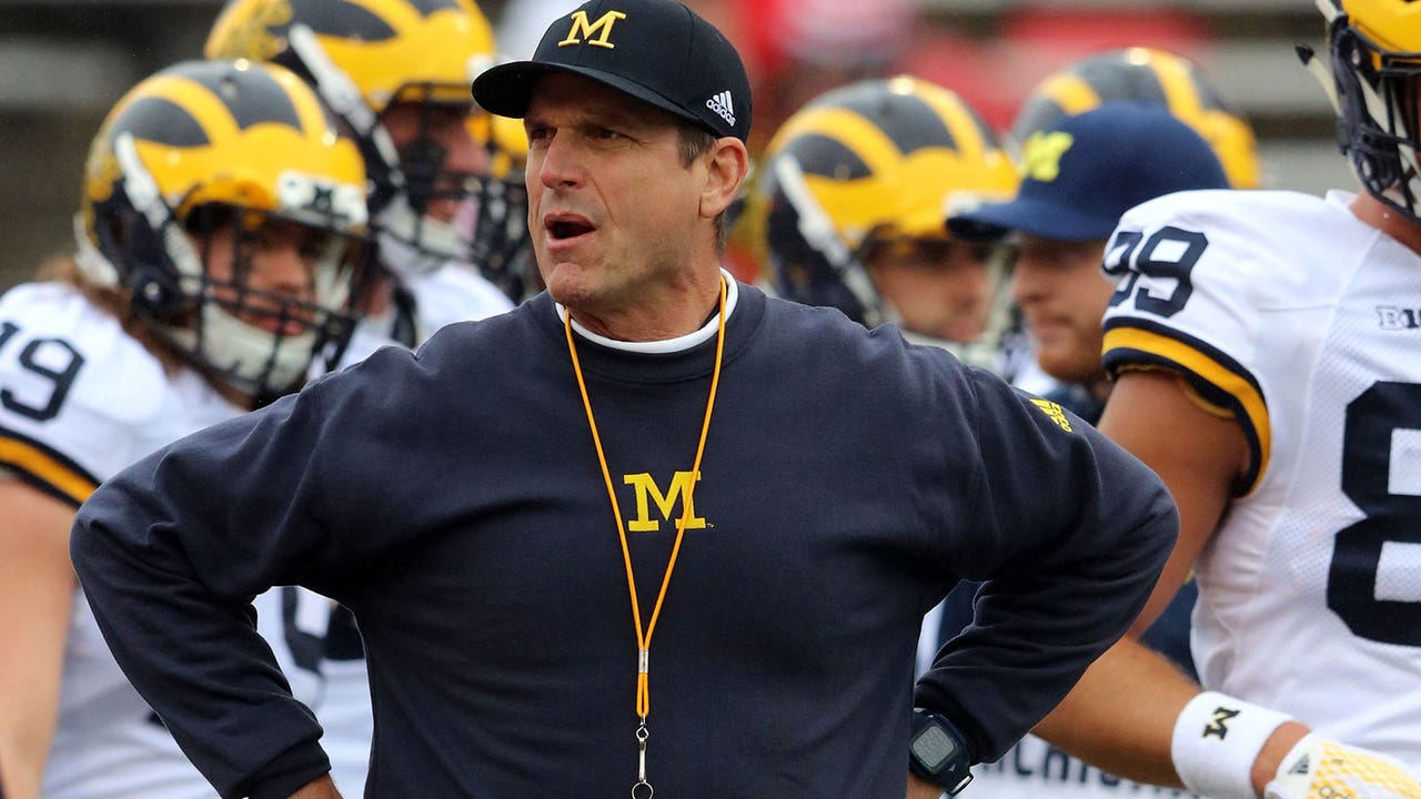 Quirky Harbaugh making football fun again at Michigan